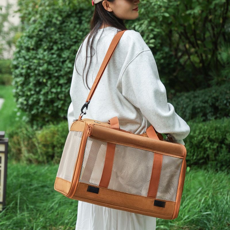 Multifunctional Pet Travel Bag: Large Capacity, Breathable, Portable, Handheld or Crossbody Pet Bag - Brown